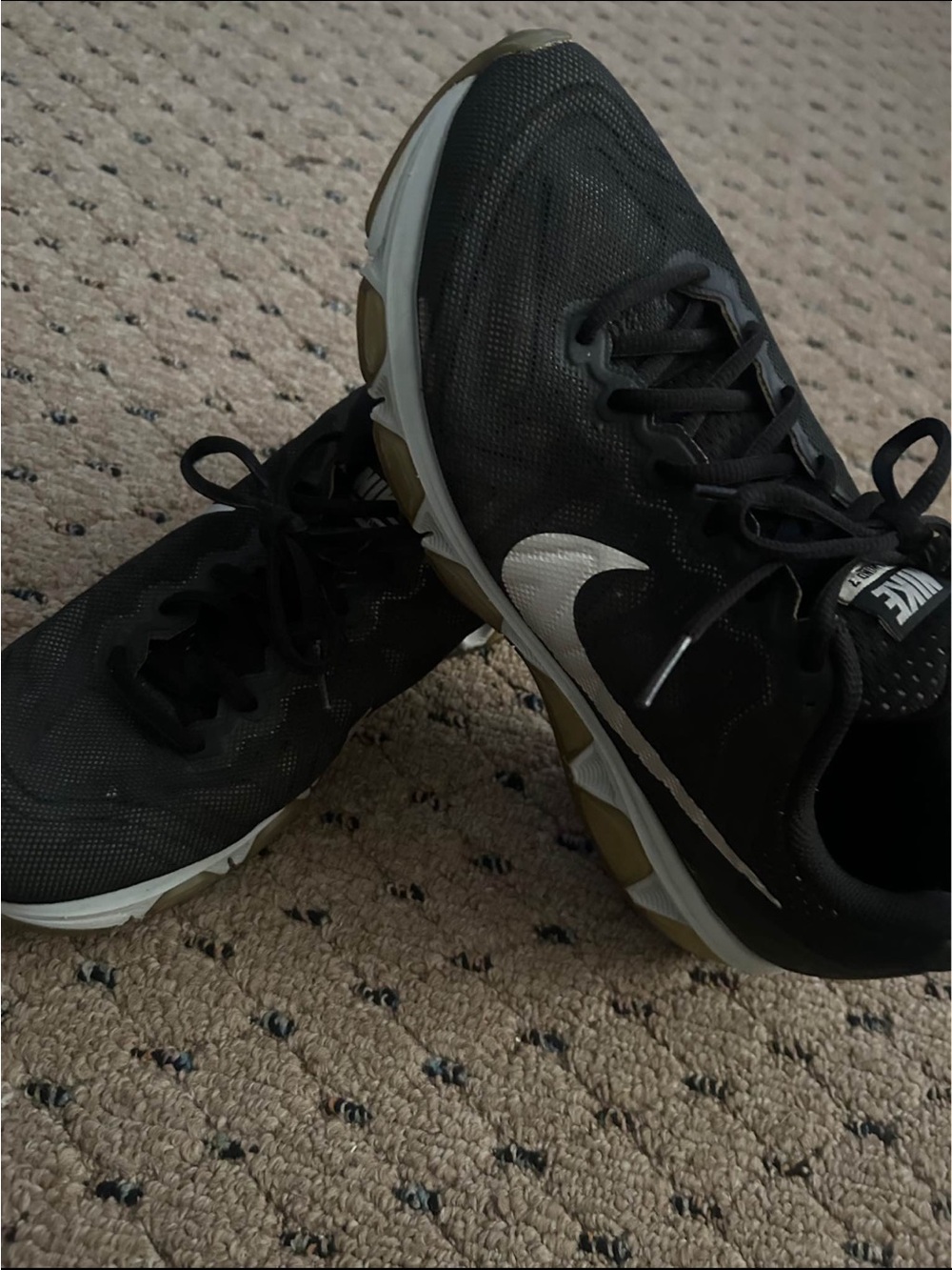 Nike Black Athletic Shoes with White Swoosh